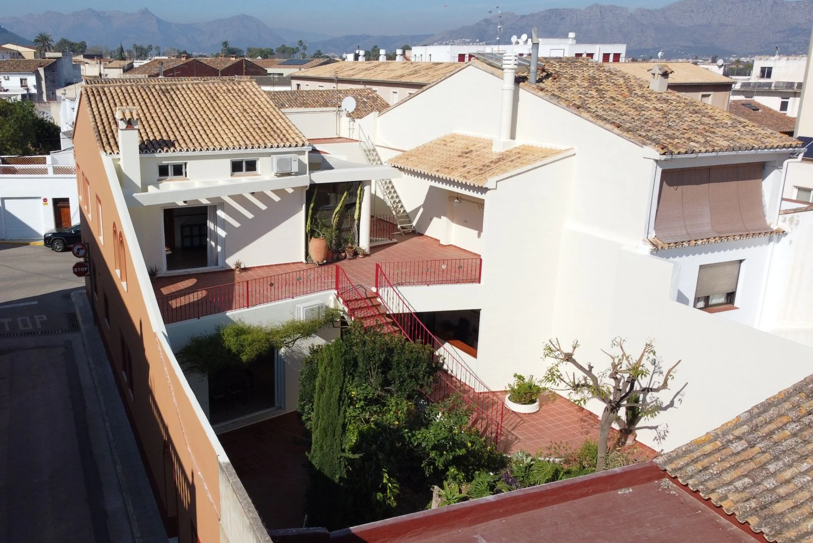 Spectacular village house with a large patio, barbecue, and garage.
