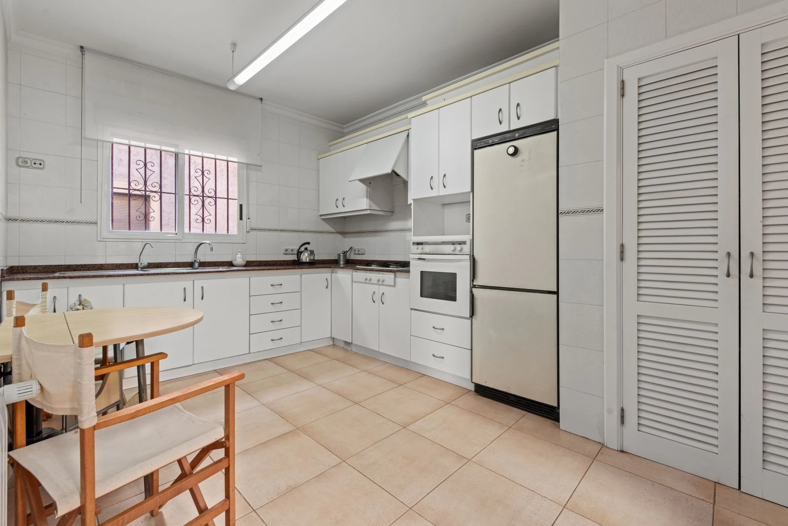 Spectacular village house with a large patio, barbecue, and garage.