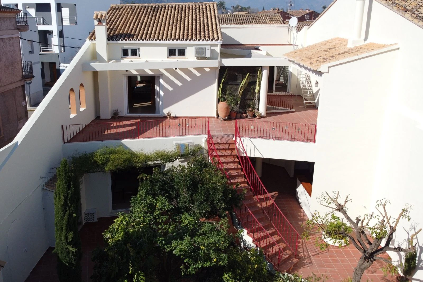 Spectacular village house with a large patio, barbecue, and garage.