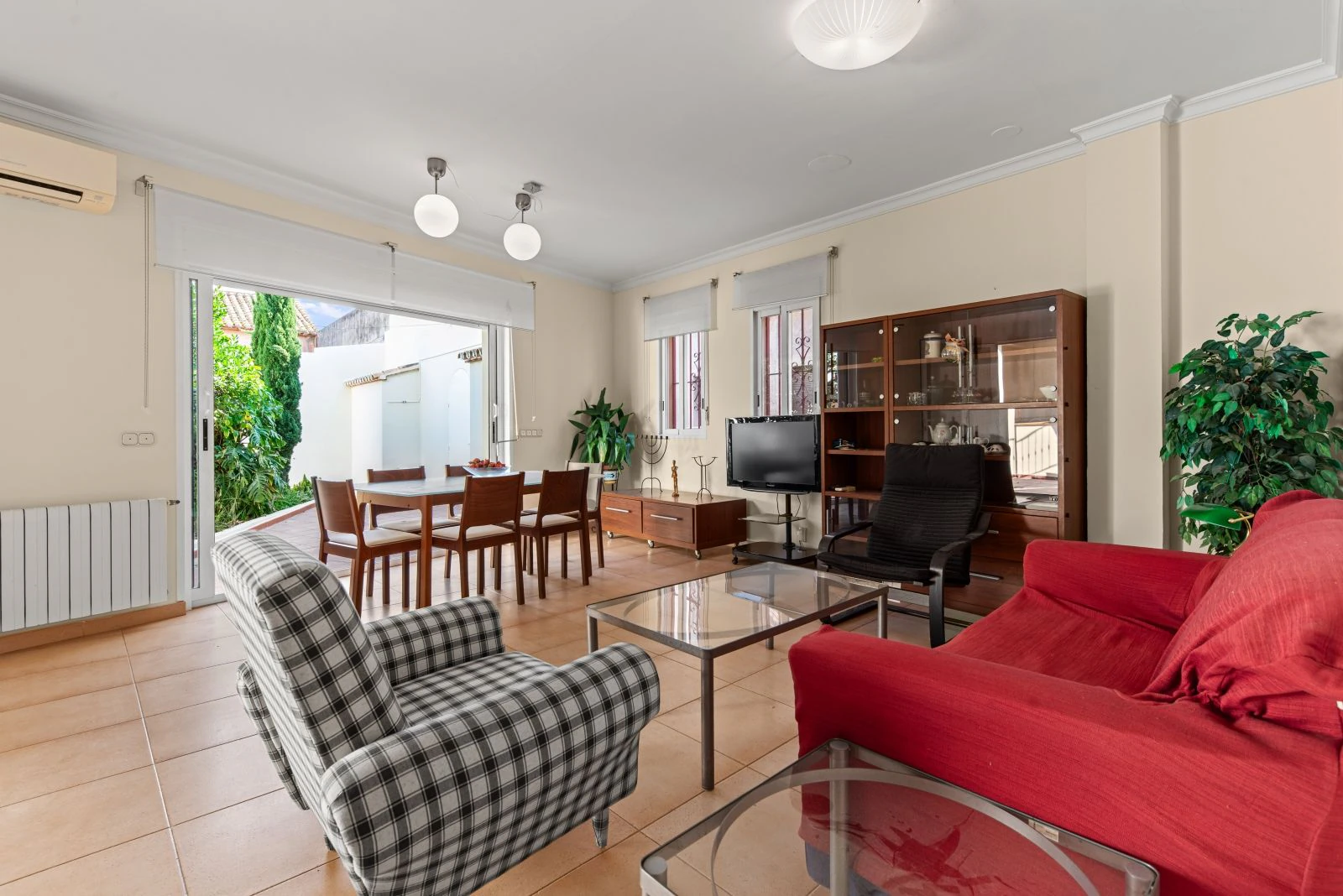 Spectacular village house with a large patio, barbecue, and garage.