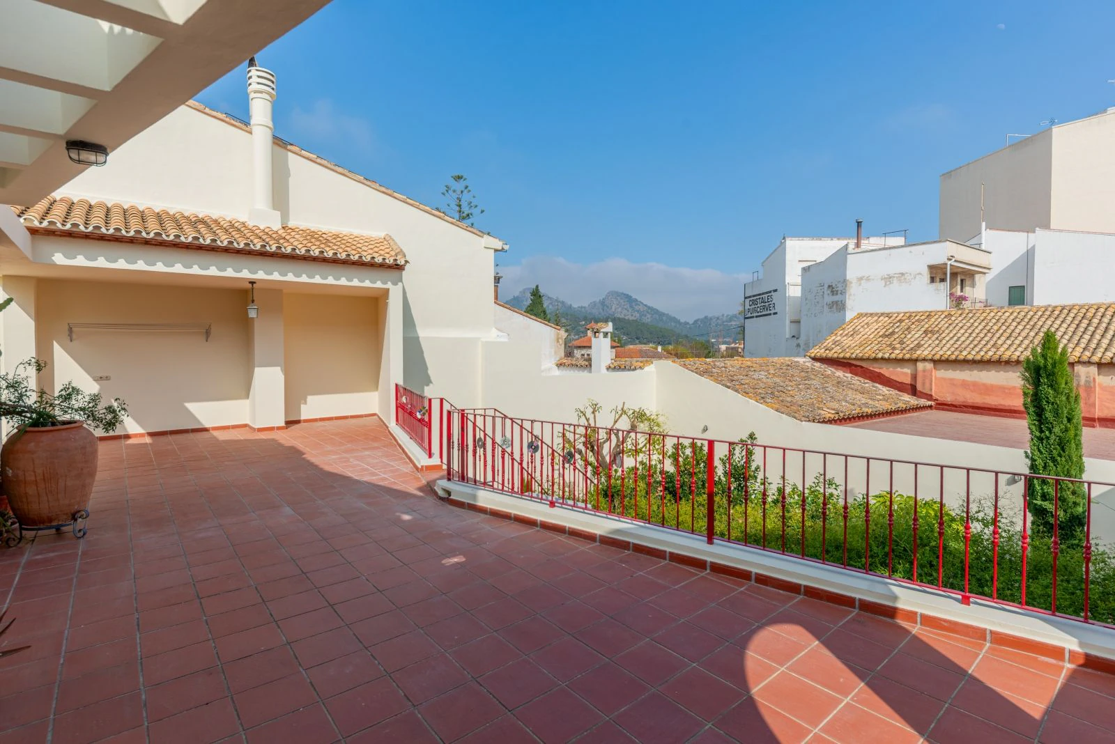 Spectacular village house with a large patio, barbecue, and garage.