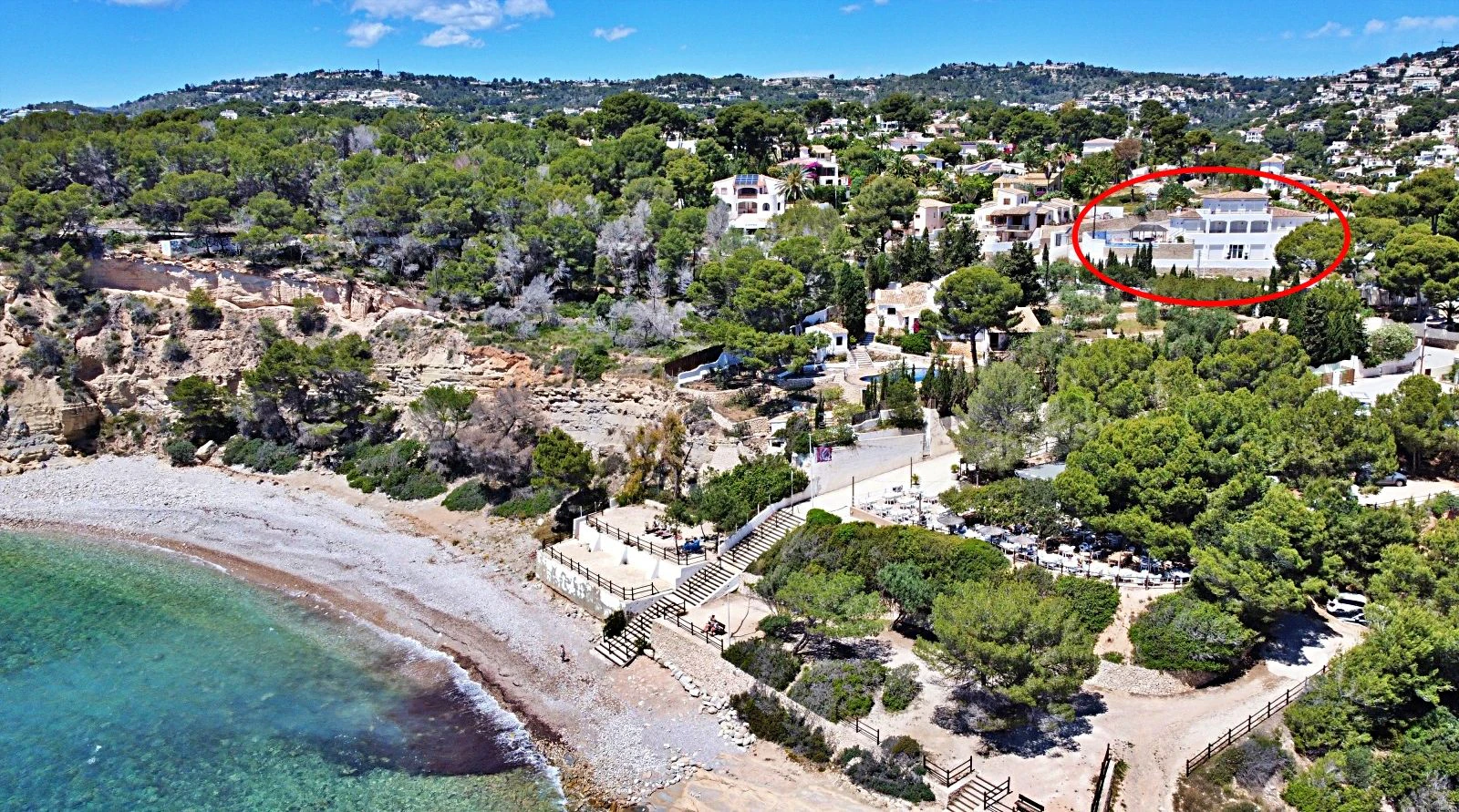 Designer villa with fantastic sea views in Mediterranean Ibiza style, just 100 metres from the beach.