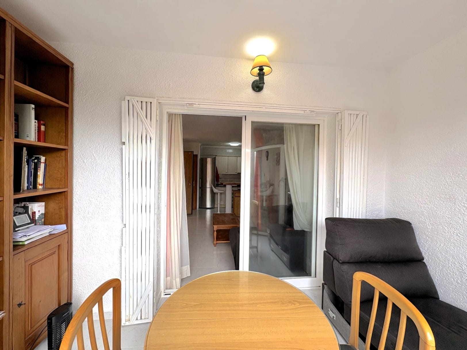 Appartement met gemeenschappelijk zwembad en tuin met gras