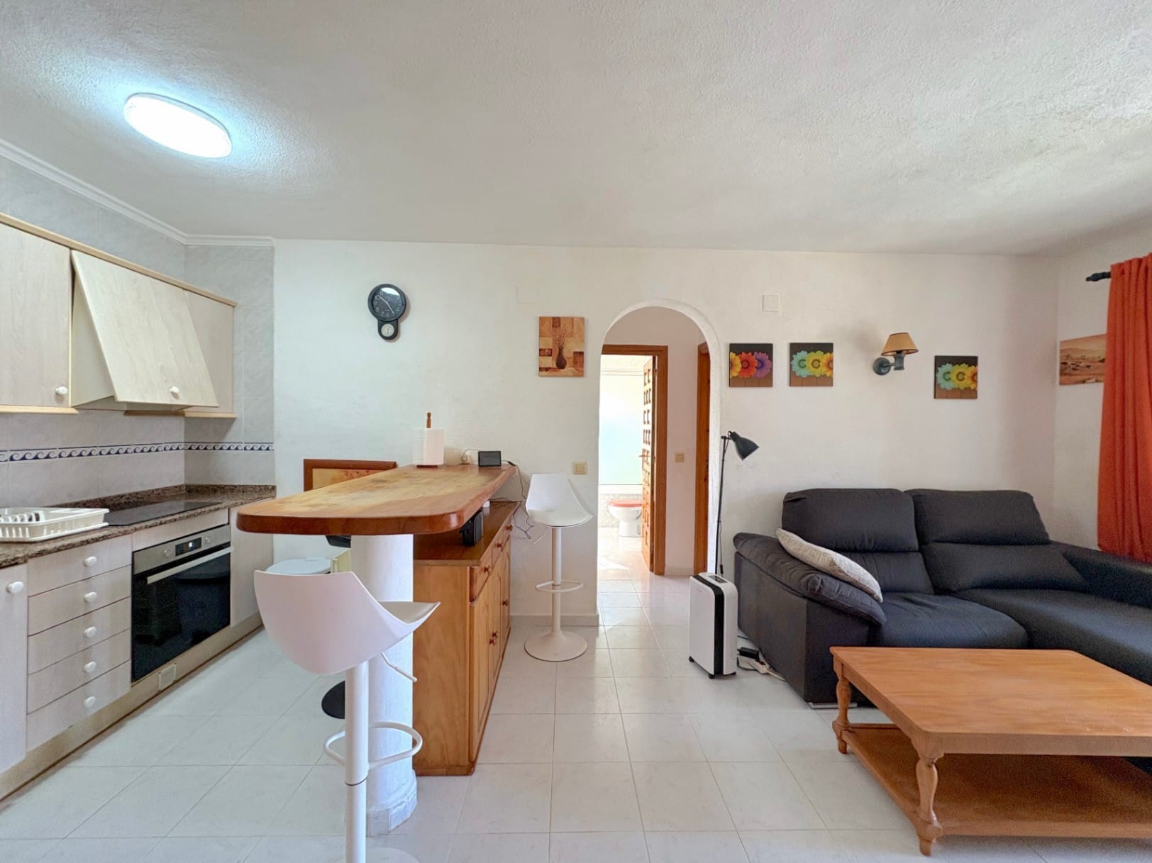 Appartement met gemeenschappelijk zwembad en tuin met gras