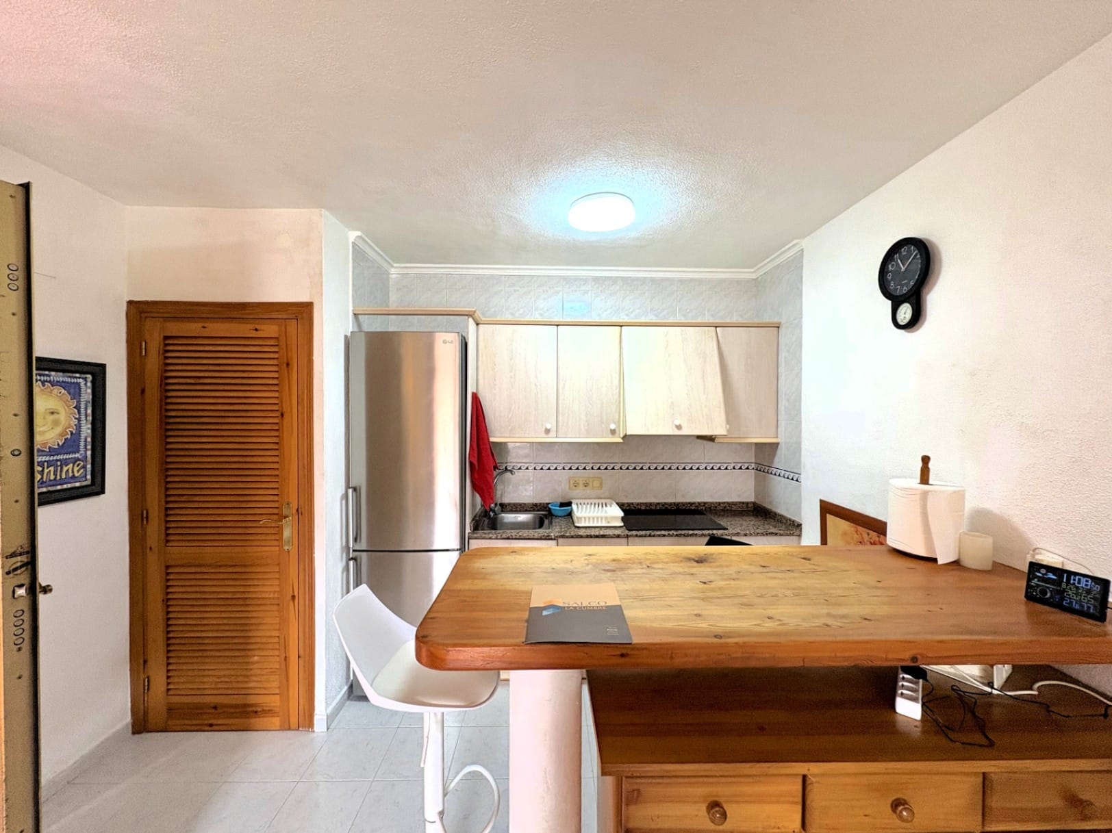 Appartement met gemeenschappelijk zwembad en tuin met gras