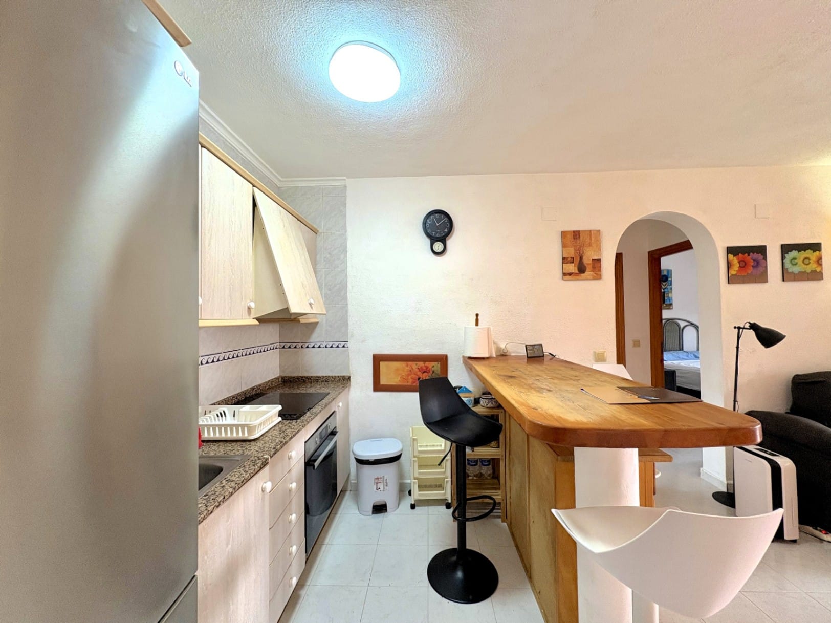 Appartement met gemeenschappelijk zwembad en tuin met gras