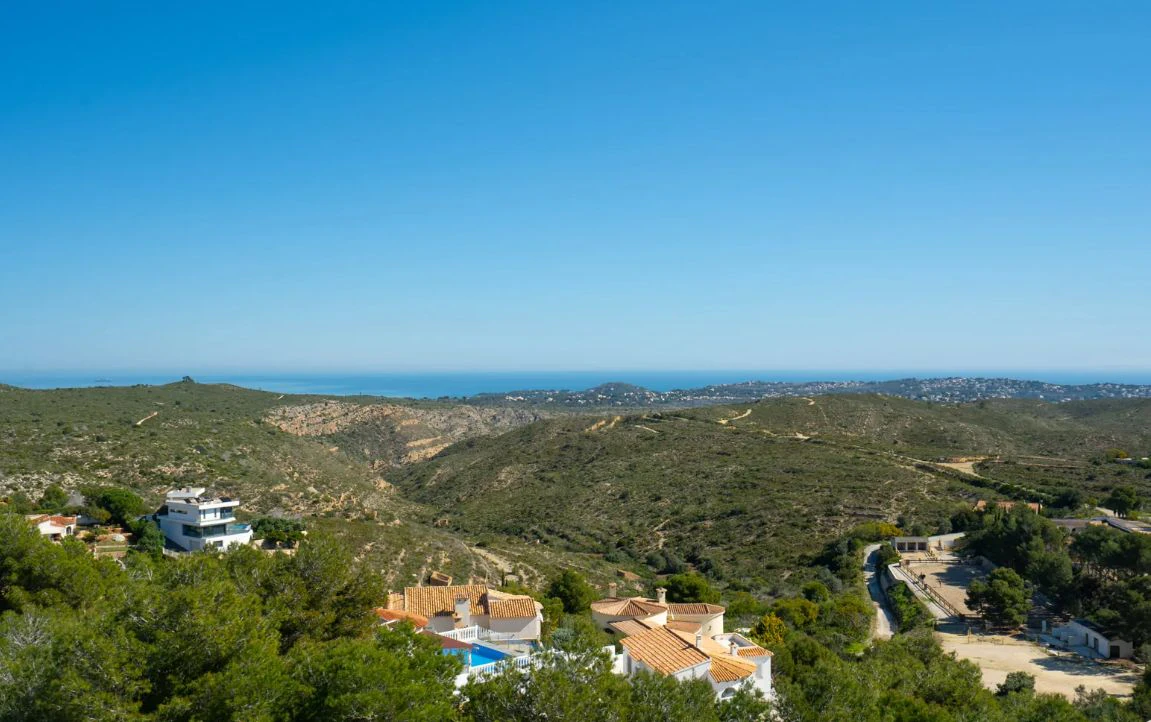 Villa tradicional con vistas panorámicas al mar y piscina climatizada en Cumbre del Sol, Benitachell
