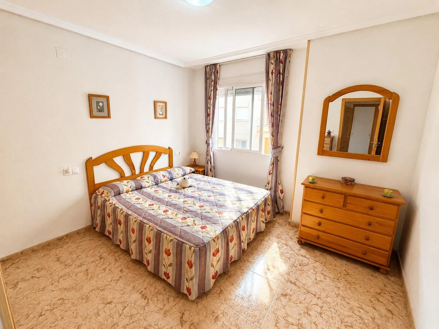 Opportunity to own a 2-bedroom apartment with a pool and garage