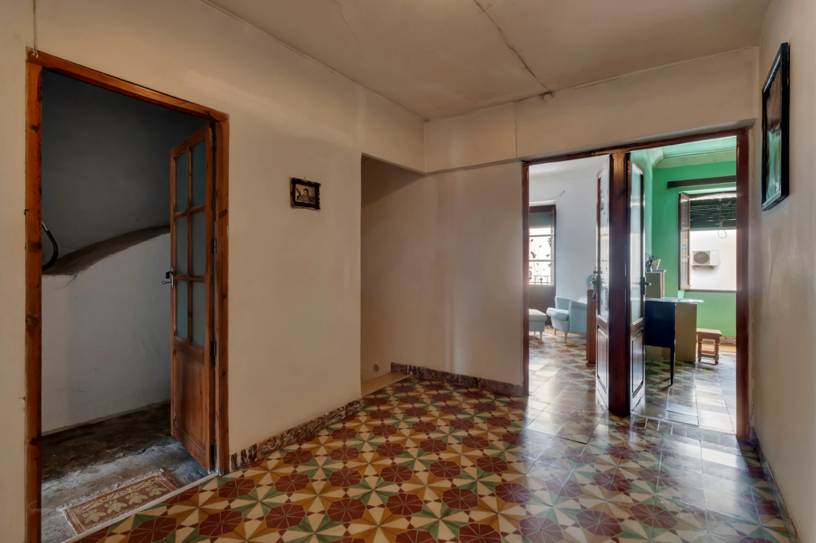 Village house with garage, spacious inner courtyard, and potential to expand the property.