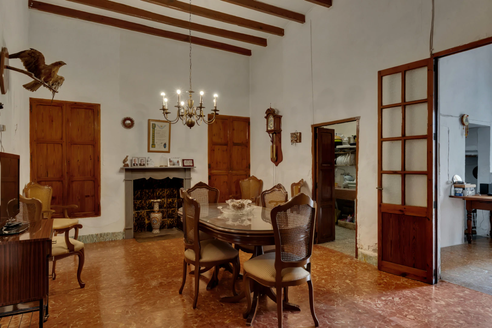 Village house with garage, spacious inner courtyard, and potential to expand the property.
