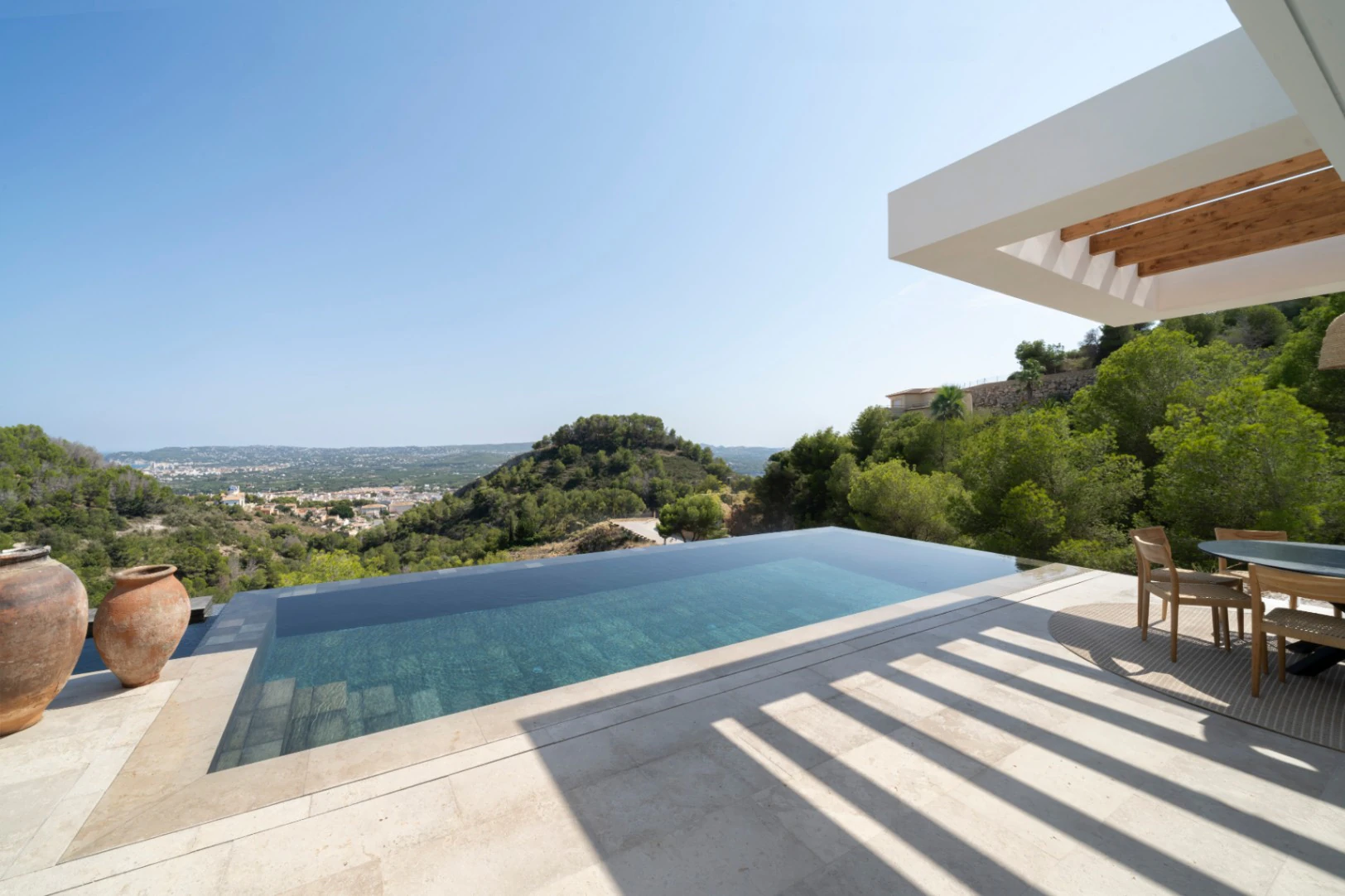 Exclusive luxury villa for sale in Jávea, with panoramic sea and mountain views.