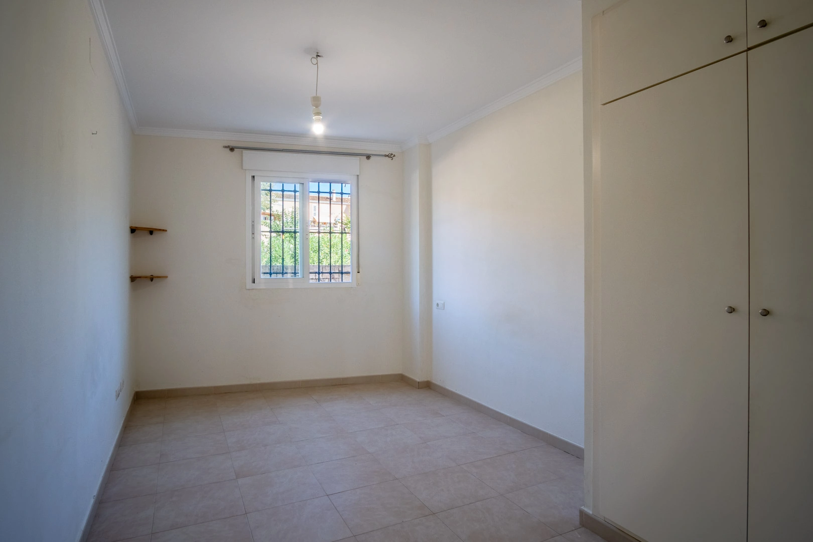 Apartamento en planta baja con piscina comunitaria en venta en Jesús Pobre.