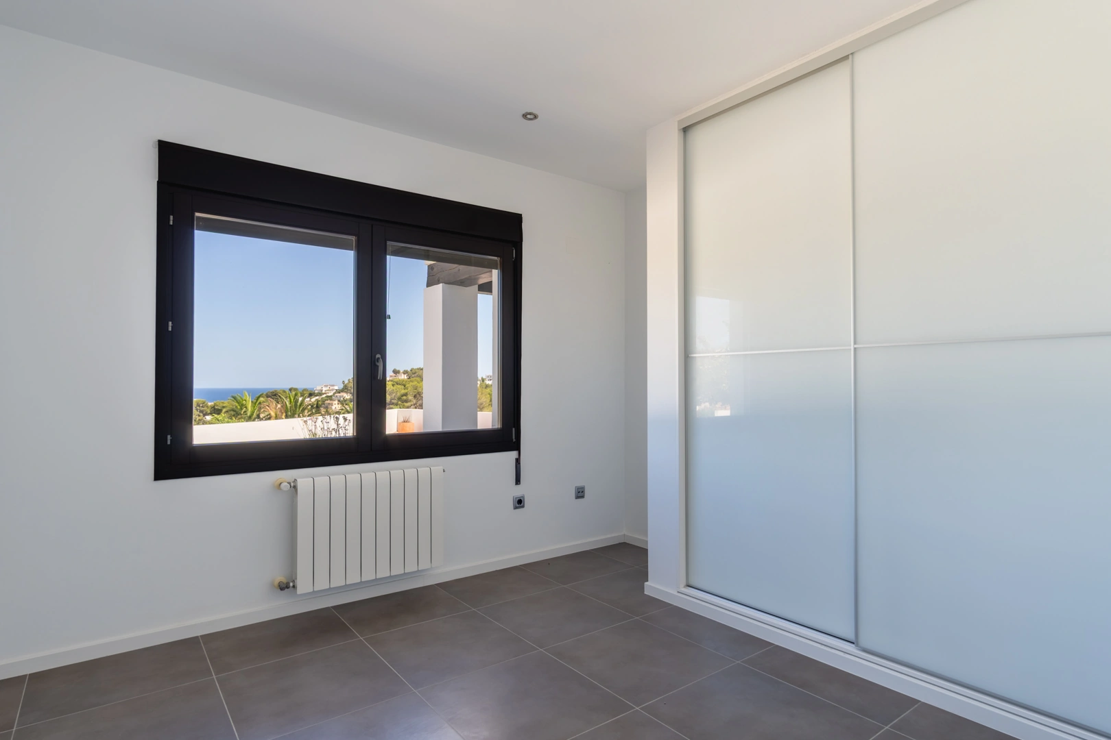 Villa tradicional mediterranea con vistas panoramicas al mar a la venta en Moraira.