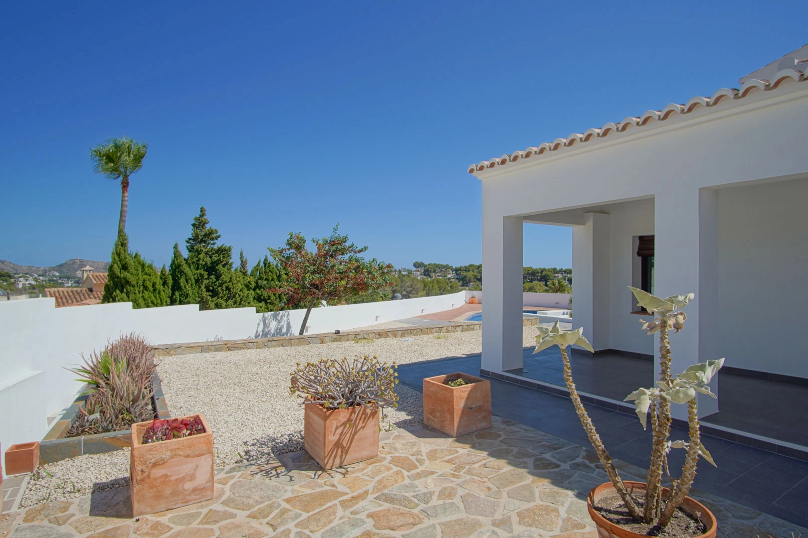 Villa tradicional mediterranea con vistas panoramicas al mar a la venta en Moraira.