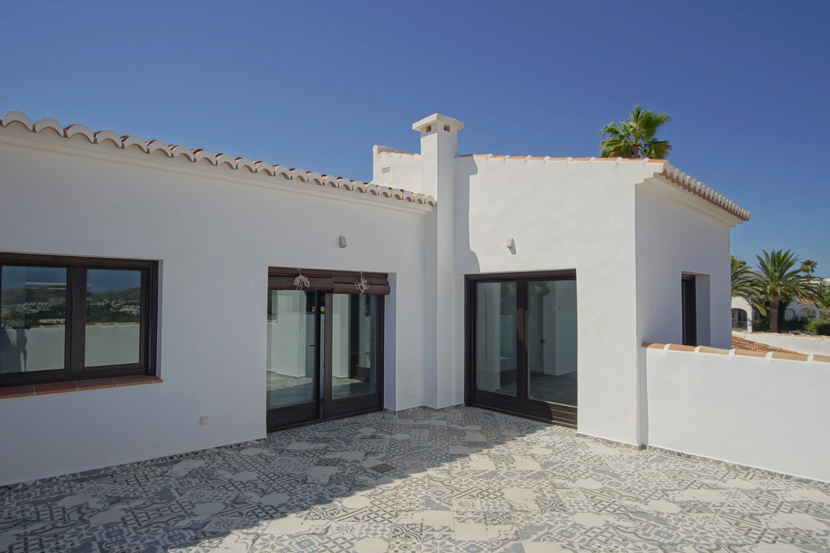 Villa tradicional mediterranea con vistas panoramicas al mar a la venta en Moraira.