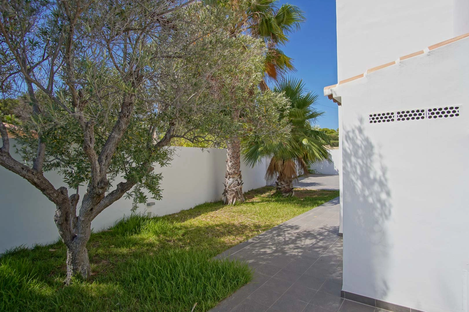 Villa tradicional mediterranea con vistas panoramicas al mar a la venta en Moraira.