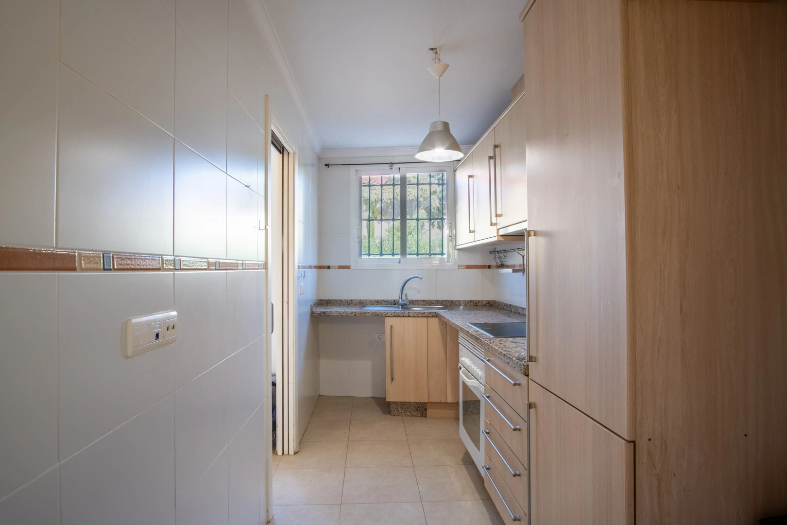 Apartamento en planta baja con piscina comunitaria en venta en Jesús Pobre.