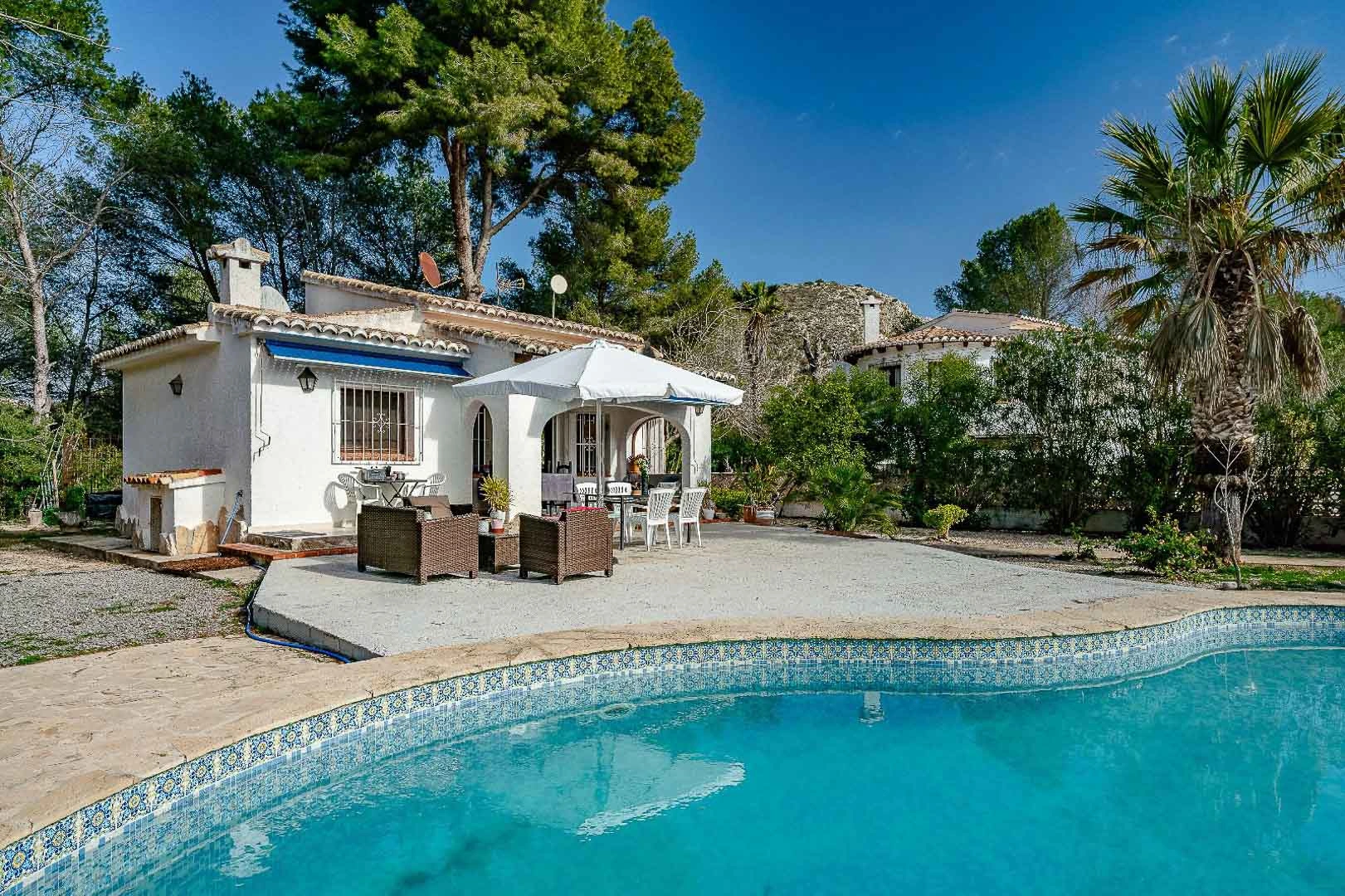 Charming villa for sale in Moraira with 2 bedrooms and a private pool.