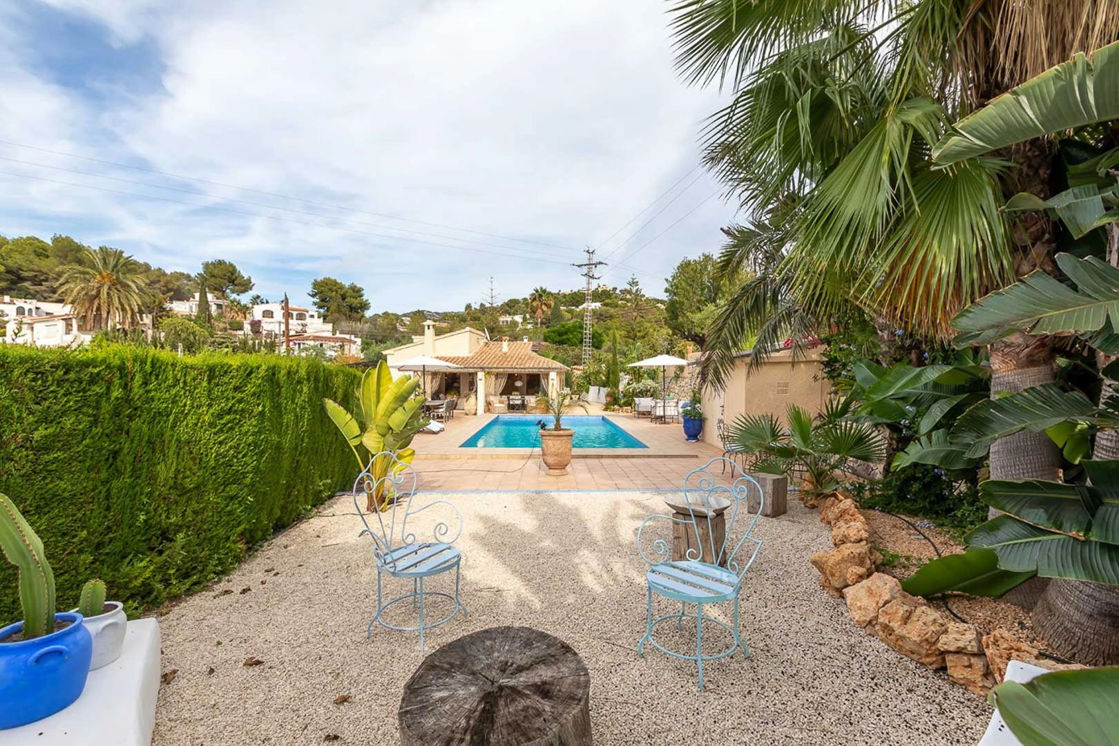 Renovated single-storey villa with pool and garden.