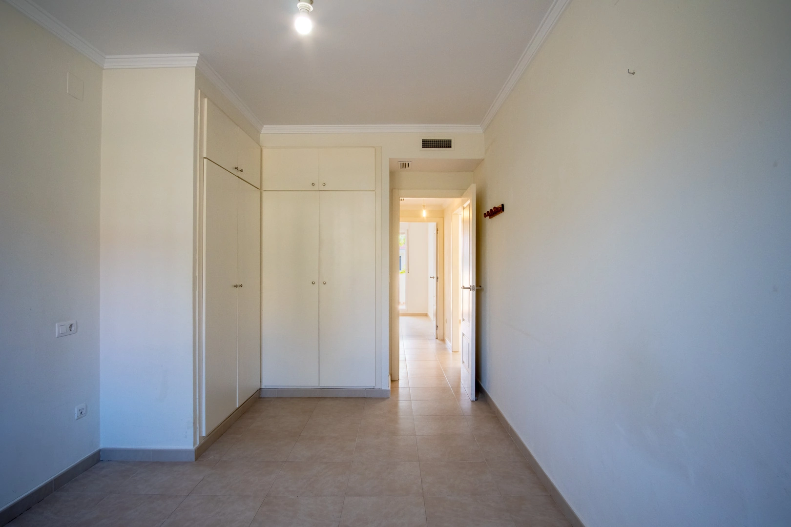 Apartamento en planta baja con piscina comunitaria en venta en Jesús Pobre.