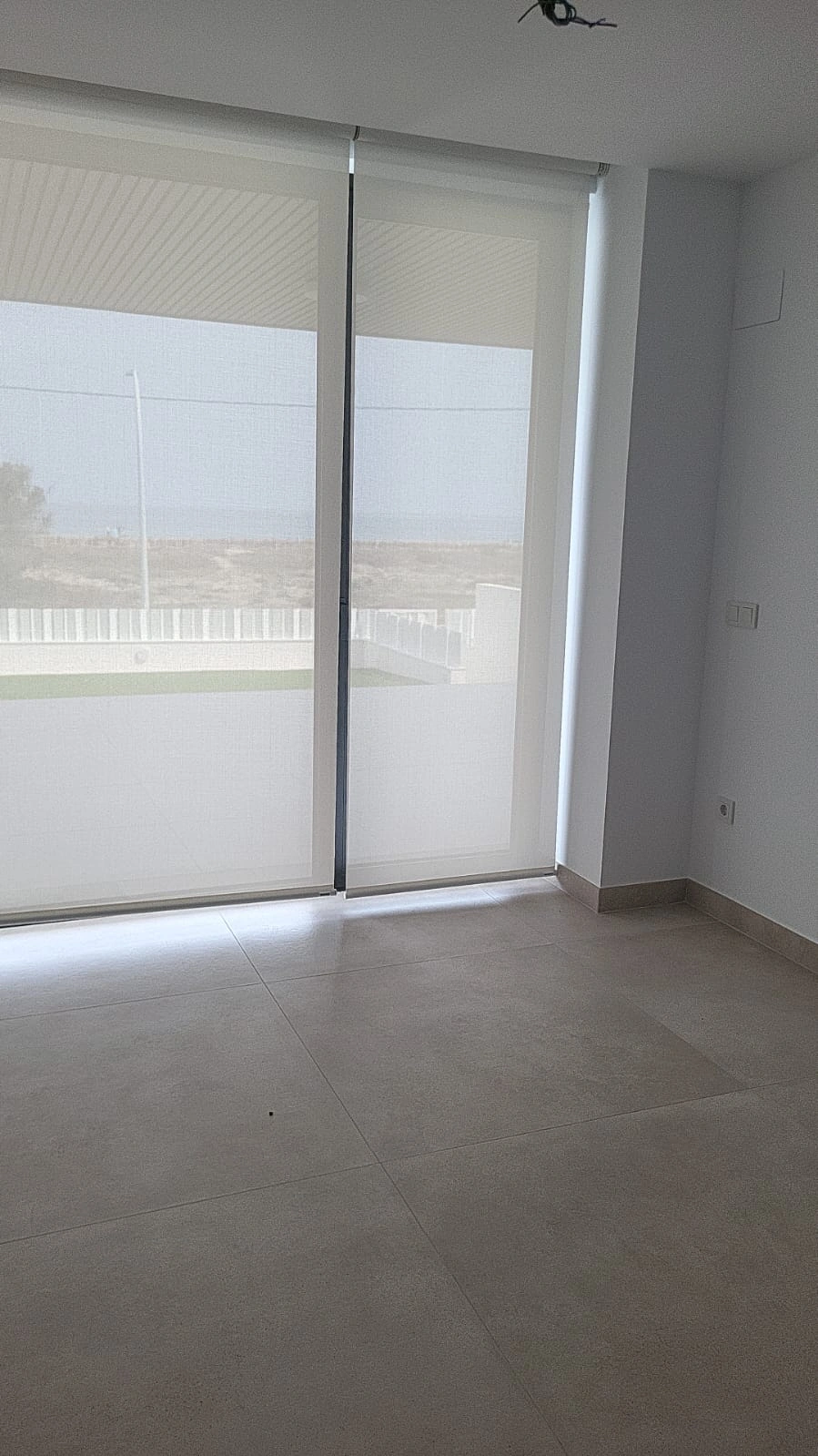 Espectacular planta baja frente al mar con jardín privado