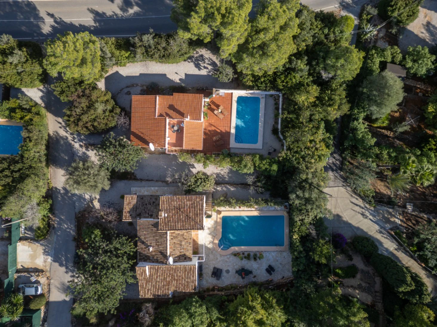 Fantastisch toevluchtsoord in finca-stijl – twee afzonderlijke woningen met twee zwembaden op een privéterrein van 2.032 m².