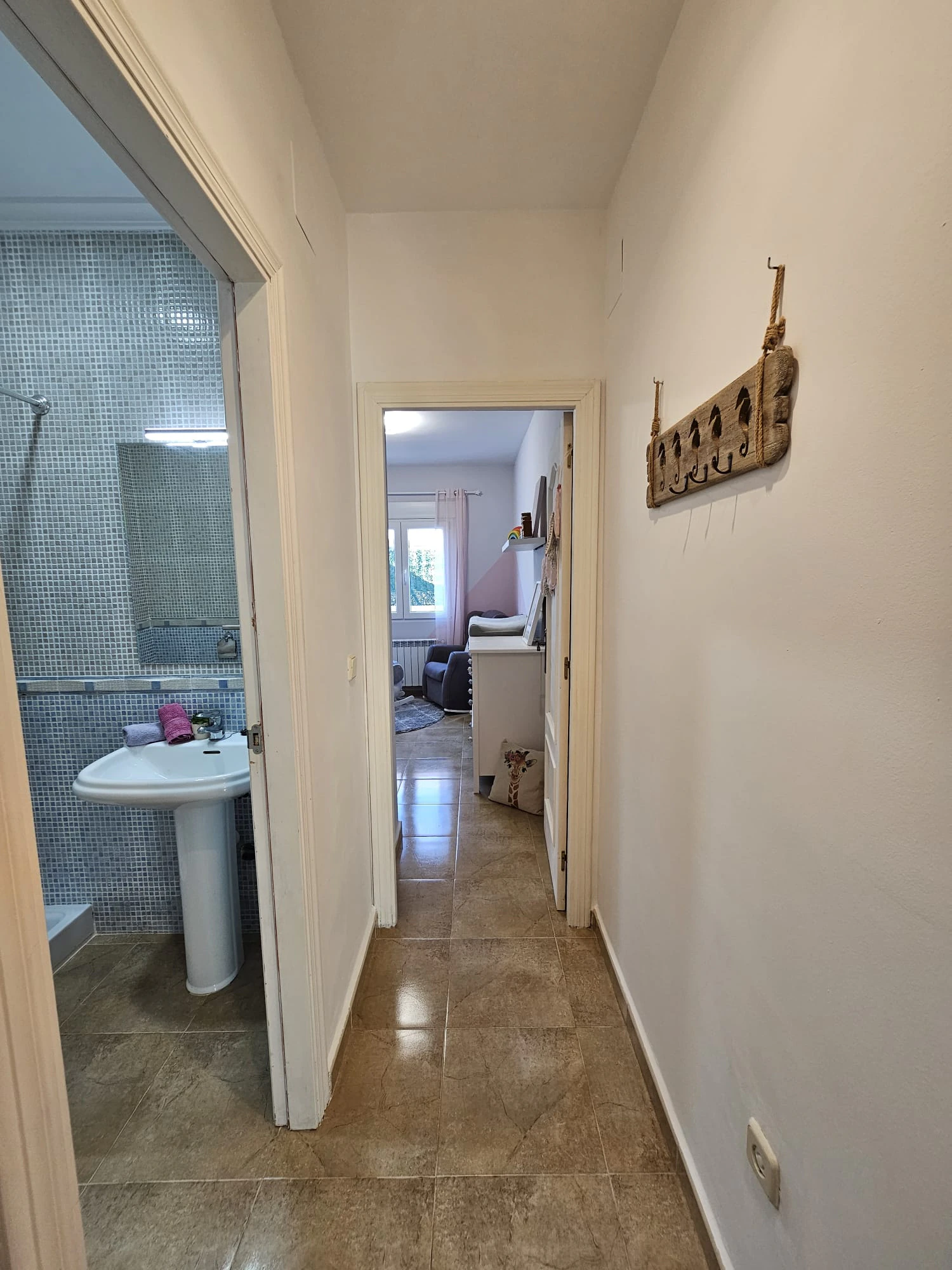 Casa adosada en venta en Benitachell con 2 dormitorios y piscina comunitaria.