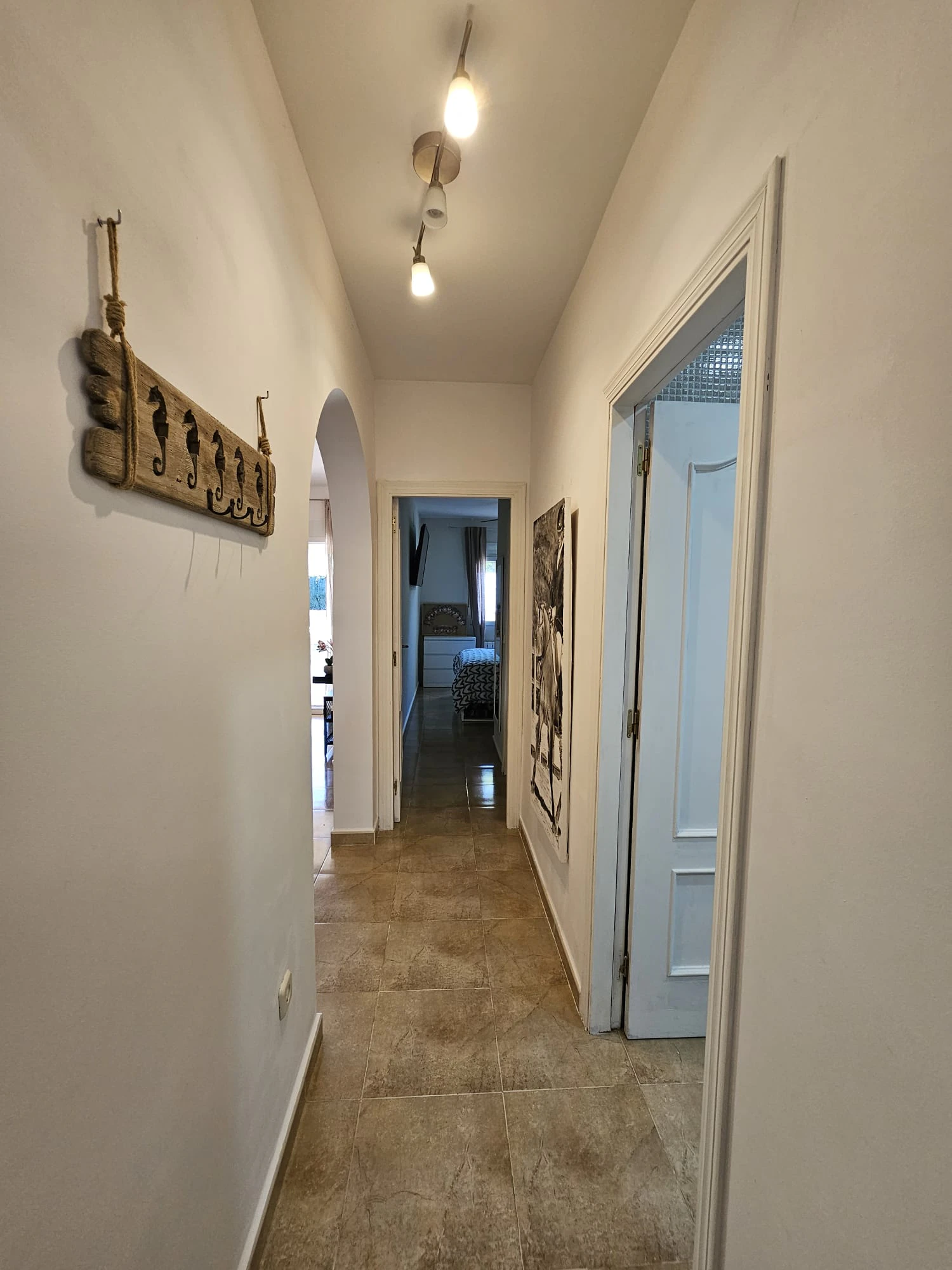 Casa adosada en venta en Benitachell con 2 dormitorios y piscina comunitaria.
