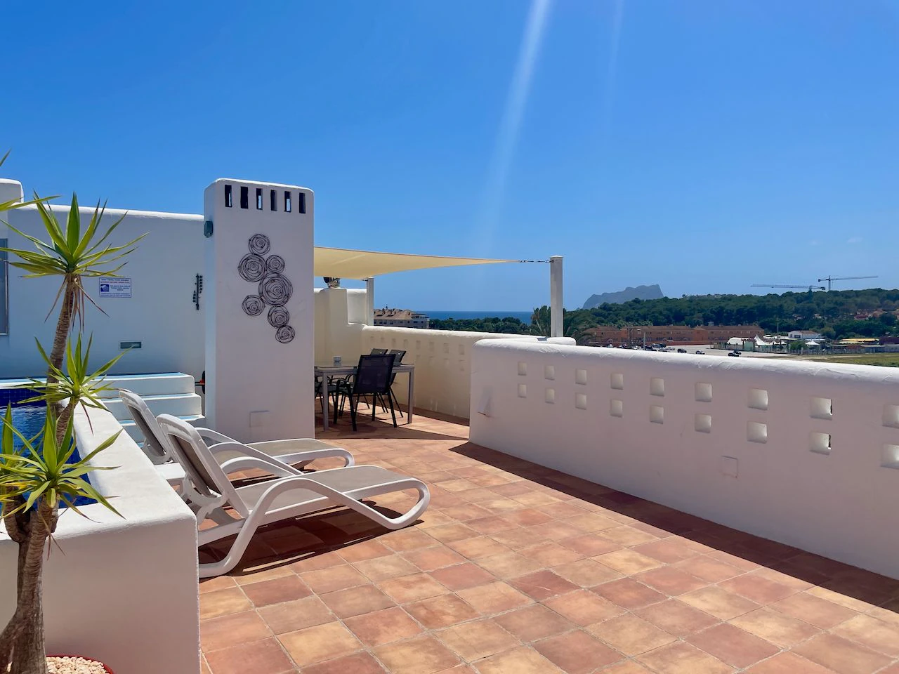 Luxury duplex Penthouse fully renovated in Club Moraira with private pool and sea views.